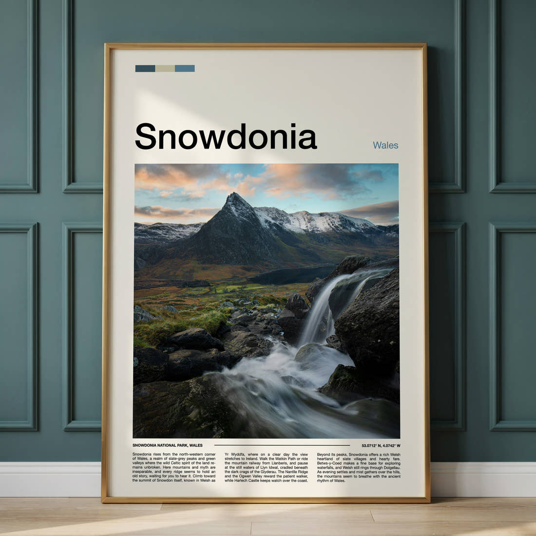 Snowdonia Waterfall And Peaks Travel Print framed on the wall of a calm, neutral bedroom