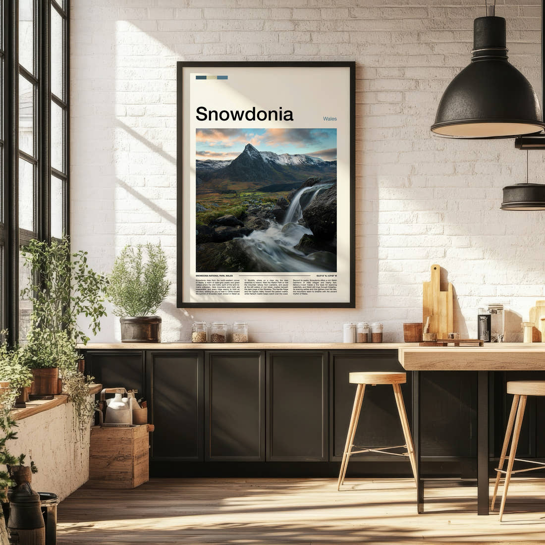 Snowdonia Waterfall And Peaks Travel Print framed on the wall of a bright kitchen and dining space