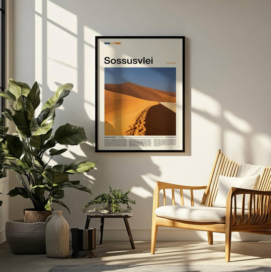 Sossusvlei Sand Dune Ridge Travel Print framed on a pale wall beside houseplants