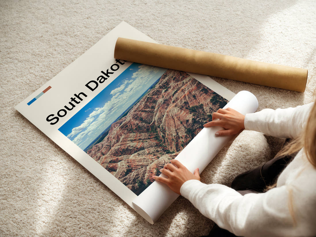 South Dakota Badlands Rock Formations Travel Print being unrolled from its postal tube