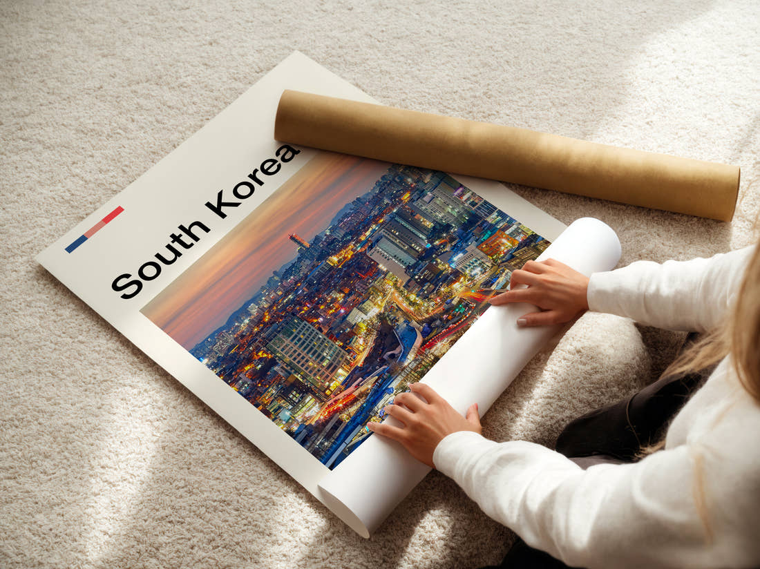 South Korea City Lights At Twilight Travel Print being unrolled from its postal tube