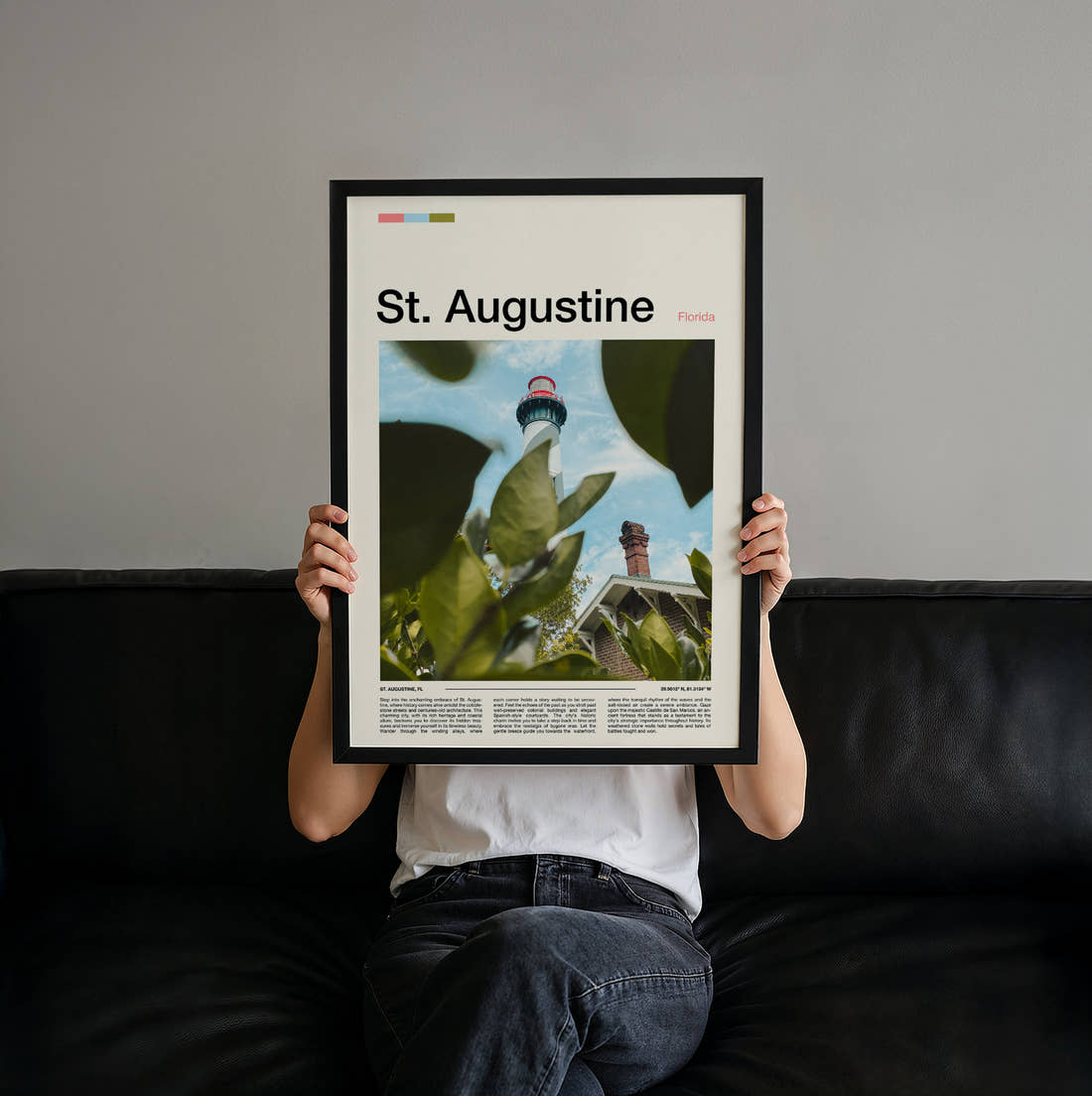 St Augustine Lighthouse Through Foliage Travel Print held up by hand to show the size of the print