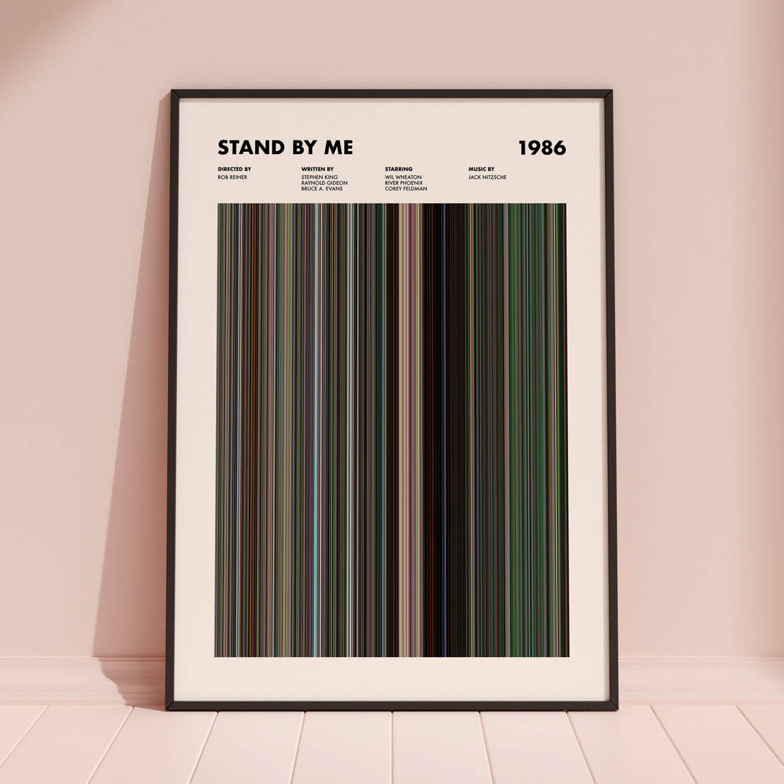 Stand By Me Movie Barcode Poster framed and leaning against a coloured wall