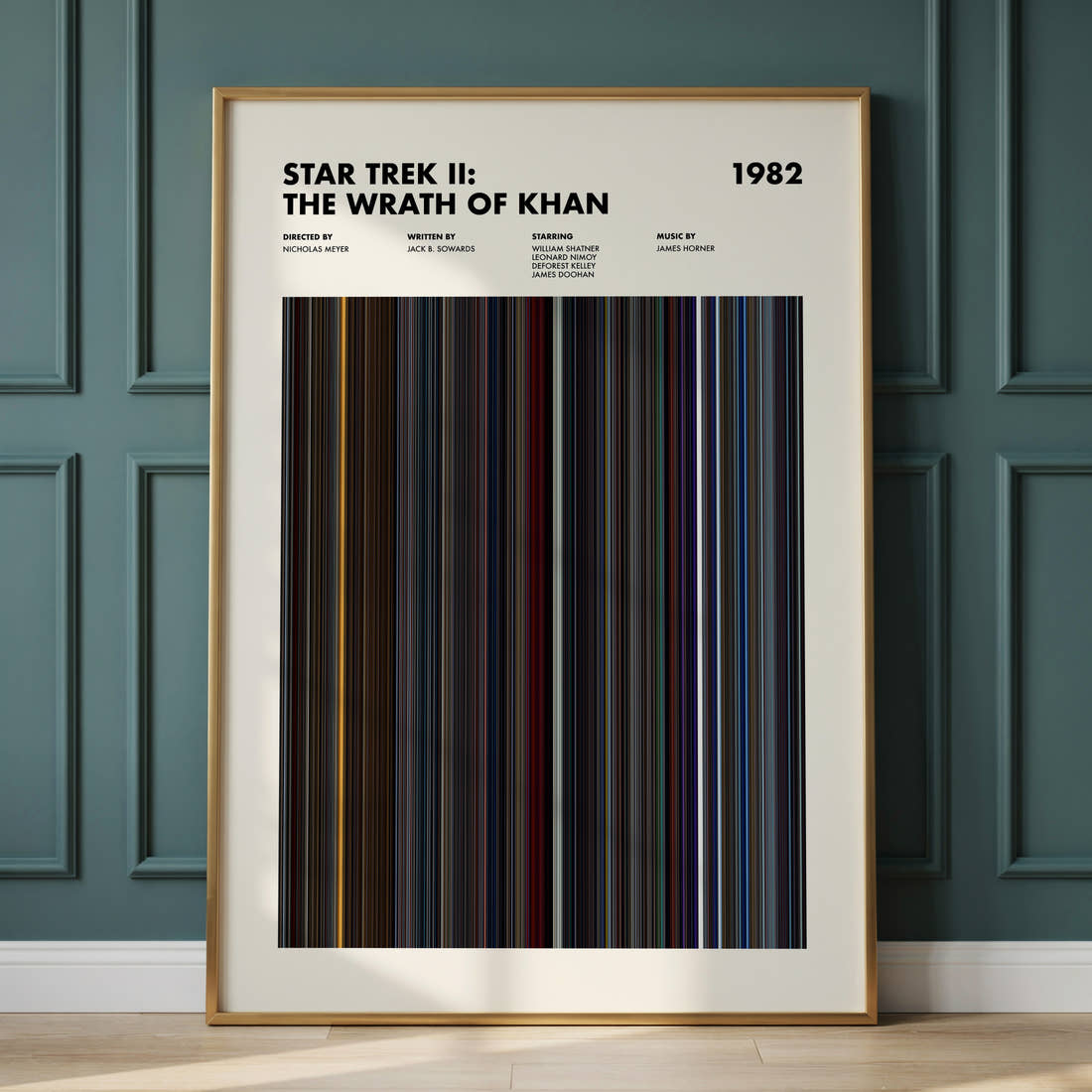 Star Trek 2 The Wrath Of Khan Movie Barcode Poster framed and leaning against a panelled wall