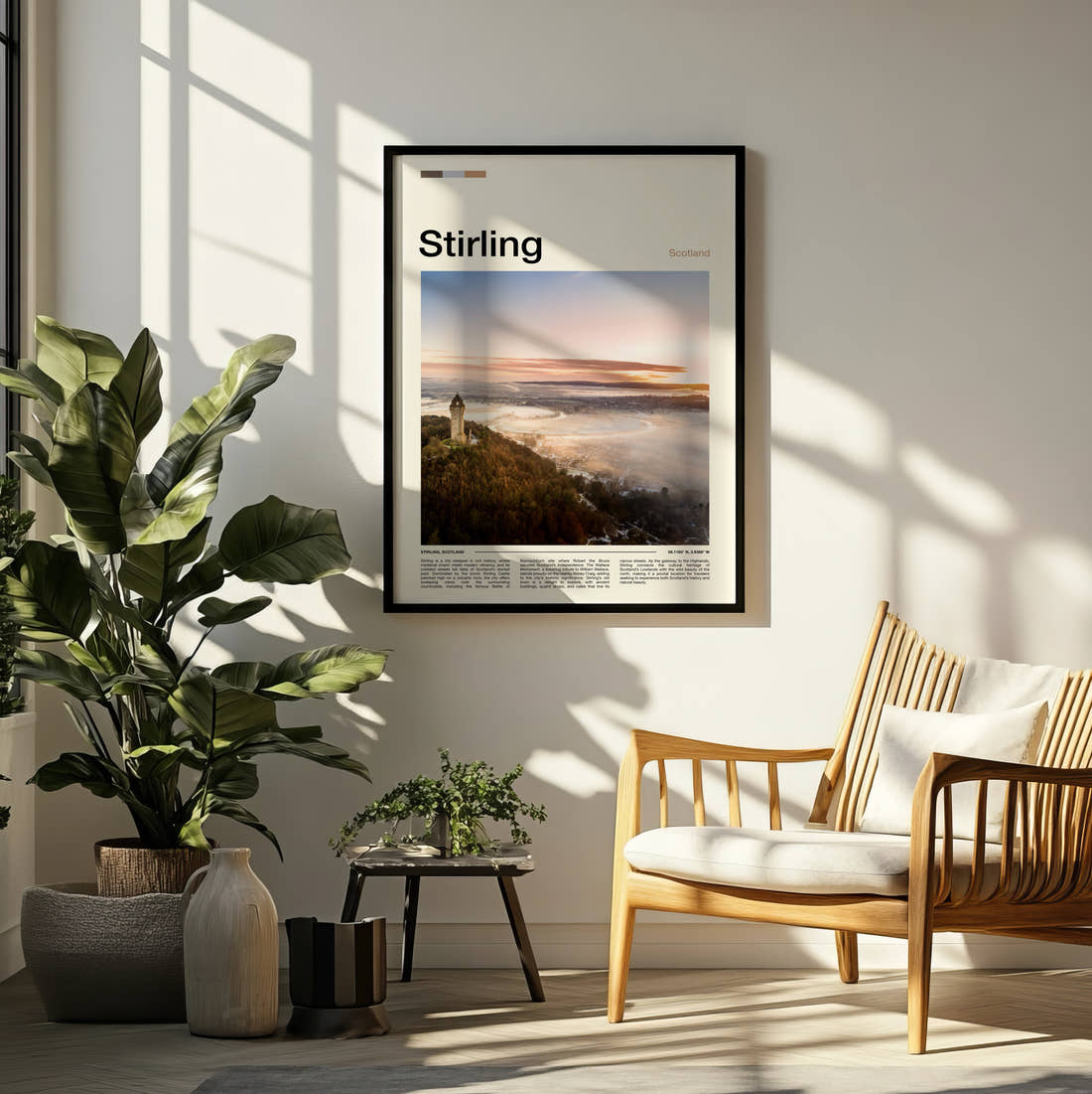 Stirling Wallace Monument Travel Print framed on a pale wall beside houseplants