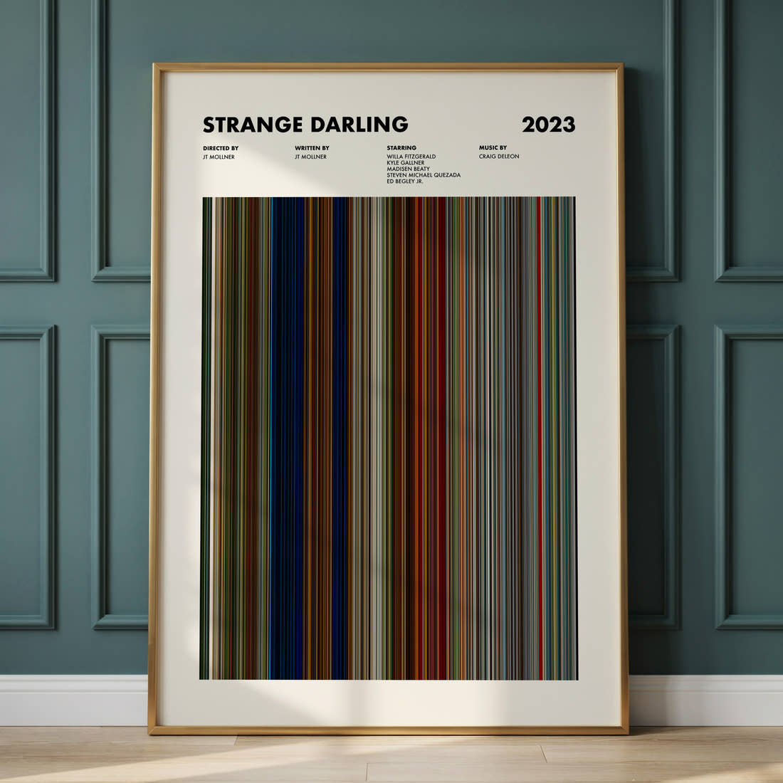 Strange Darling Movie Barcode Poster framed and leaning against a panelled wall
