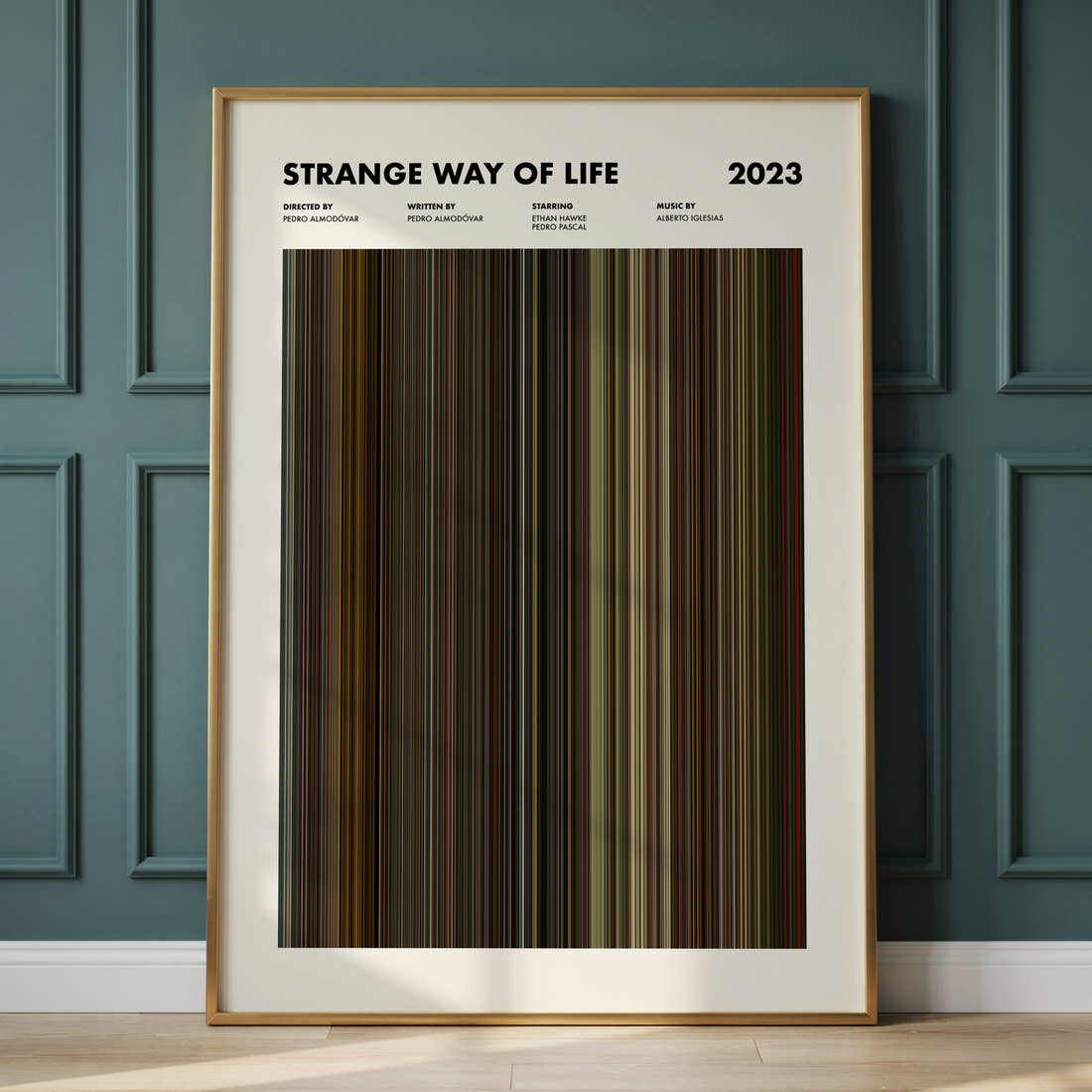 Strange Way of Life Movie Barcode Poster framed and leaning against a panelled wall