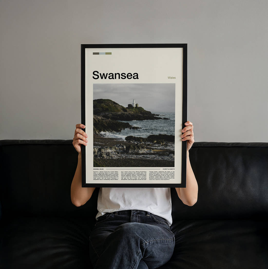 Swansea Mumbles Lighthouse Travel Print held up by hand to show the size of the print
