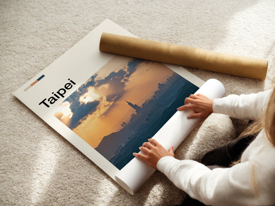 Taipei Sun Rays Over Skyline Travel Print being unrolled from its postal tube