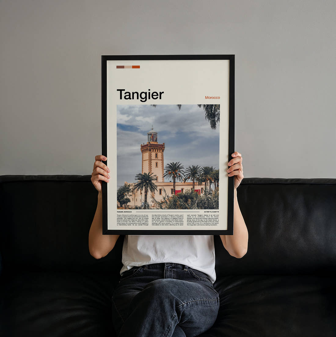 Tangier Clock Tower Travel Print held up by hand to show the size of the print