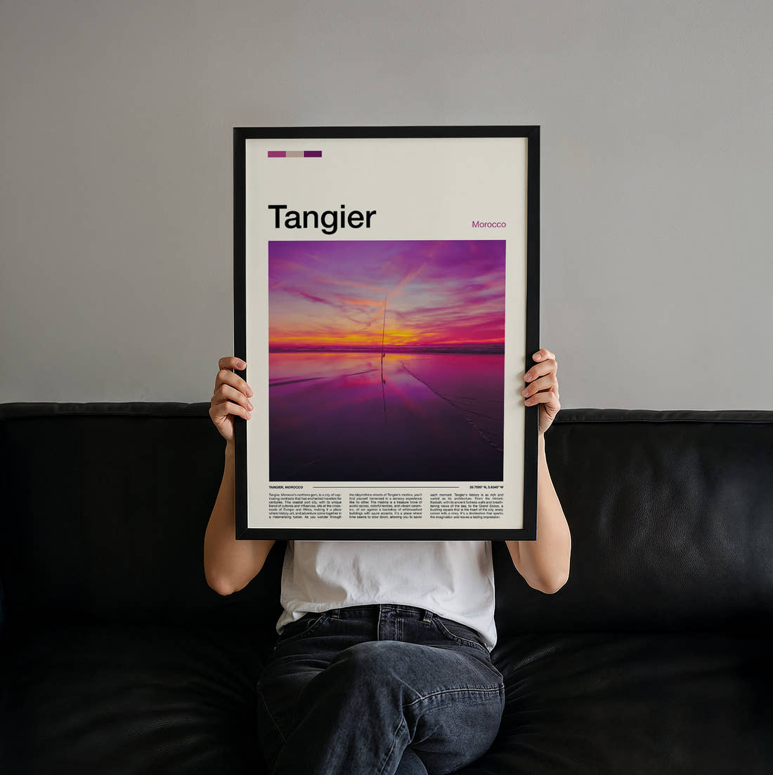 Tangier Pink Sunset Over Water Travel Print held up by hand to show the size of the print