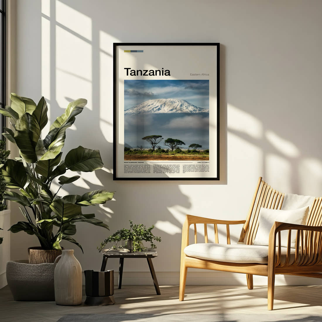 Tanzania Mount Kilimanjaro Above The Clouds Travel Print framed on a pale wall beside houseplants