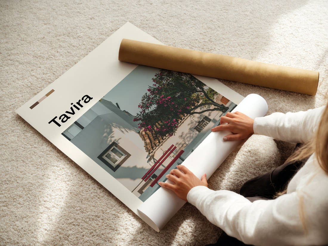Tavira Whitewashed Courtyard Corner Travel Print being unrolled from its postal tube