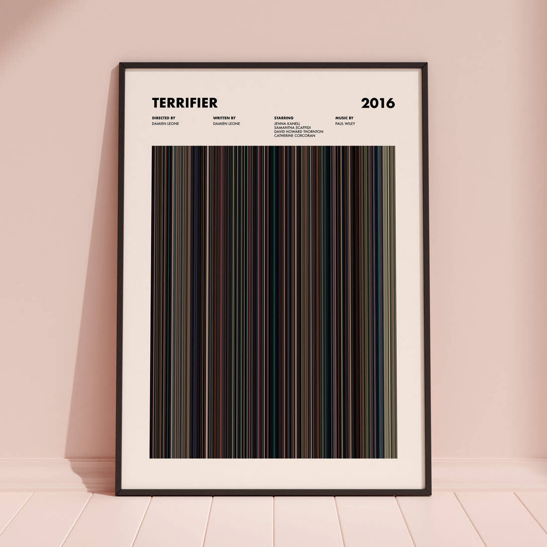 Terrifier Movie Barcode Poster framed and leaning against a coloured wall