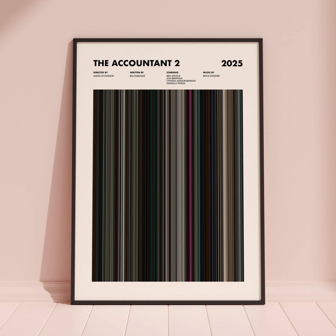 The Accountant 2 Movie Barcode Poster framed and leaning against a coloured wall