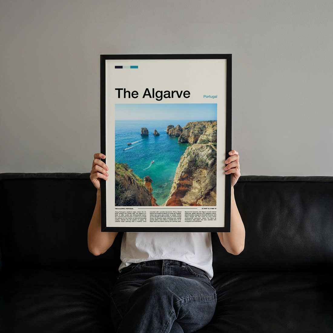 The Algarve Limestone Cliffs And Cove Travel Print held up by hand to show the size of the print