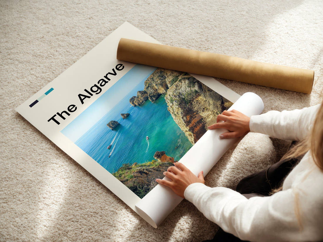 The Algarve Limestone Cliffs And Cove Travel Print being unrolled from its postal tube