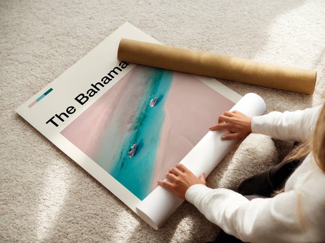 The Bahamas Boats On Turquoise Water Travel Print being unrolled from its postal tube