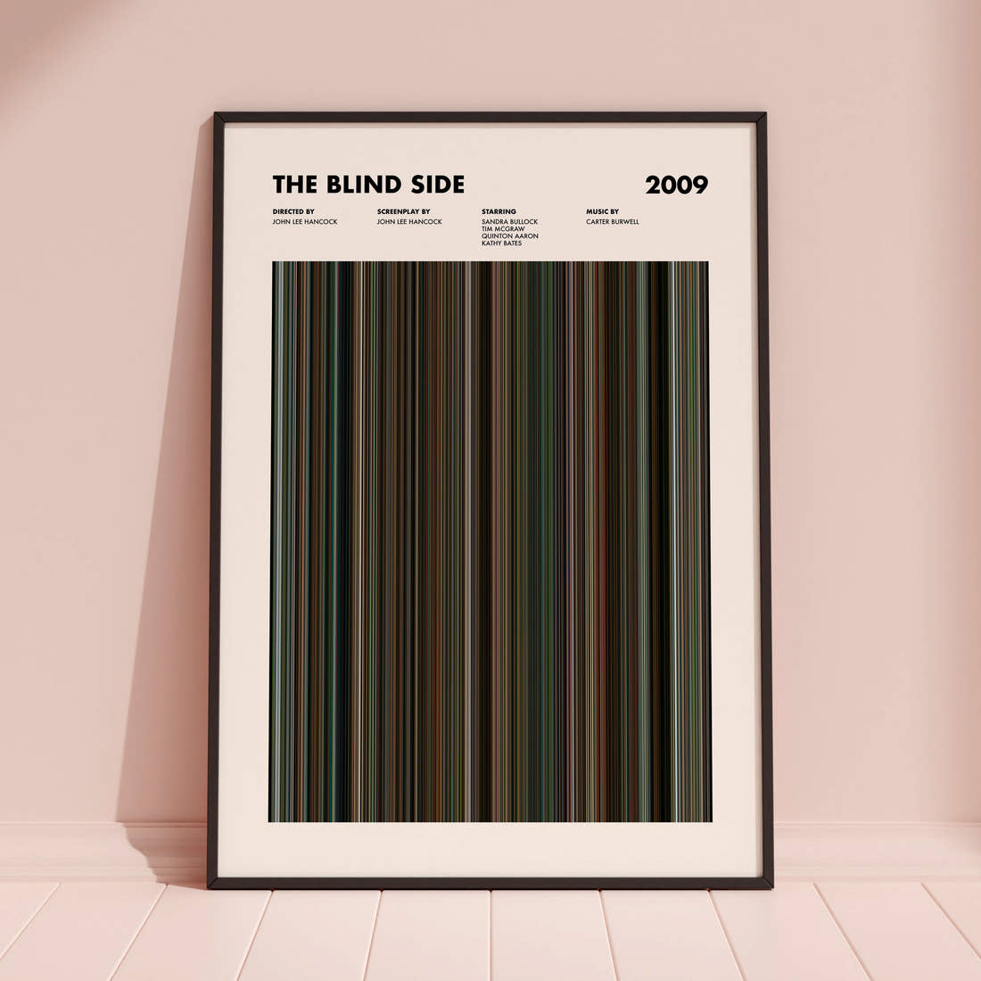 The Blind Side Movie Barcode Poster framed and leaning against a coloured wall