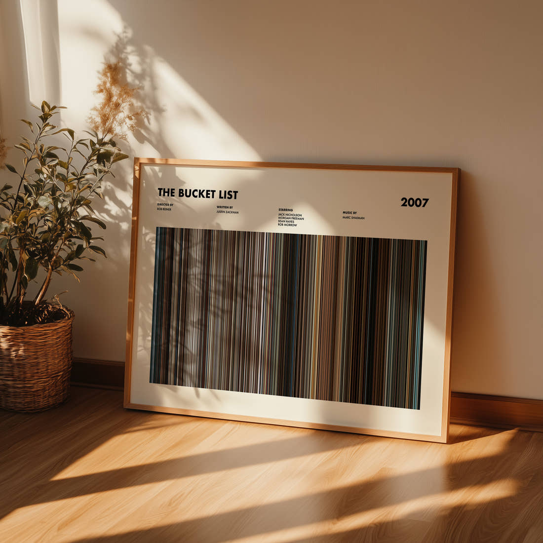 The Bucket List Movie Barcode Poster framed and leaning against a wall on a wooden floor