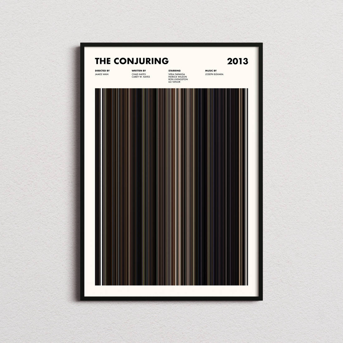The Conjuring Movie Barcode Poster framed on a plain studio wall