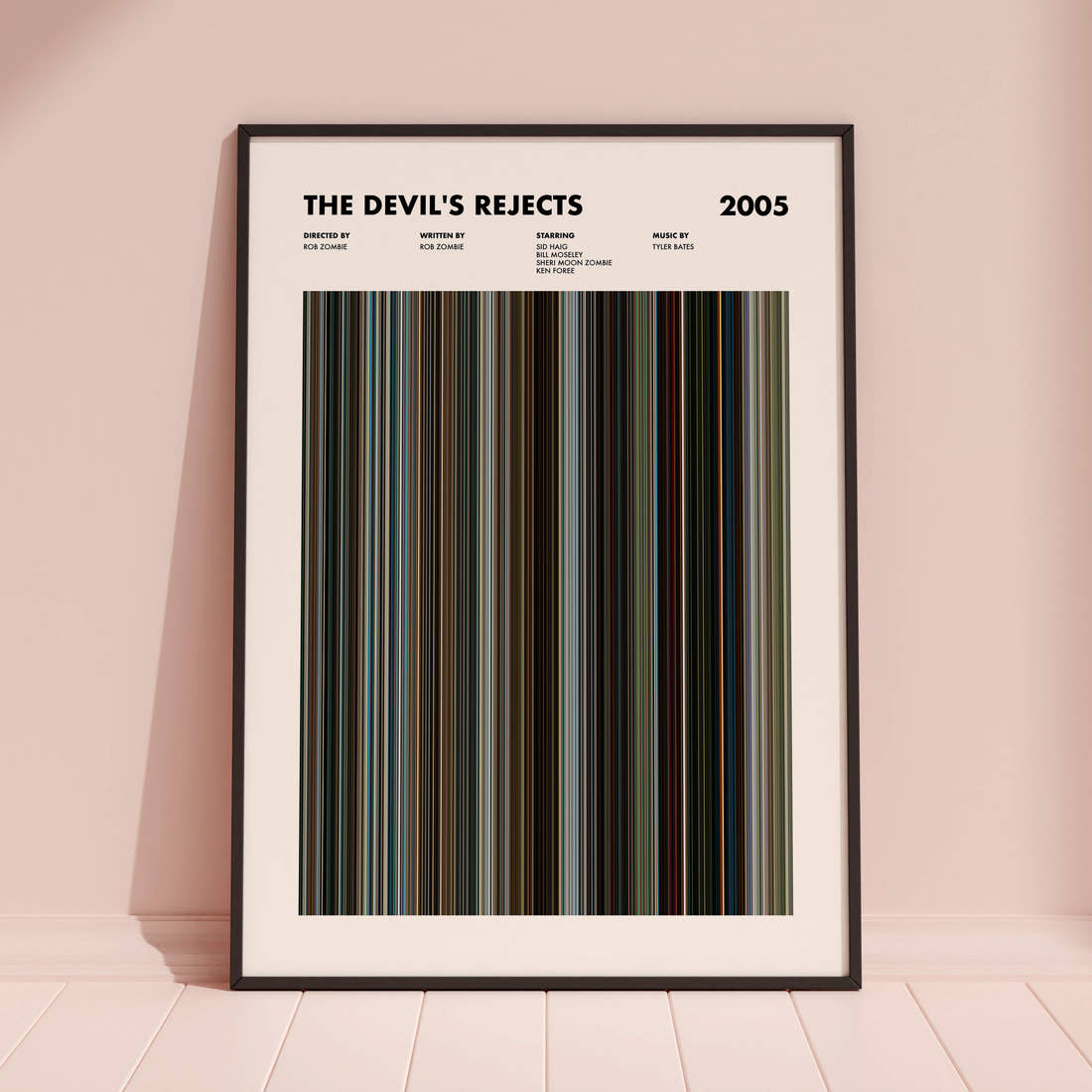 The Devil's Rejects Movie Barcode Poster framed and leaning against a coloured wall