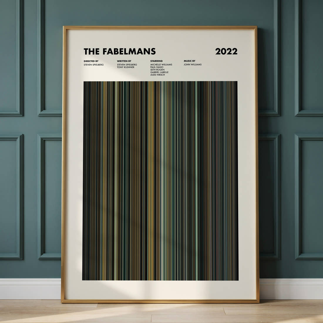 The Fabelmans Movie Barcode Poster framed and leaning against a panelled wall
