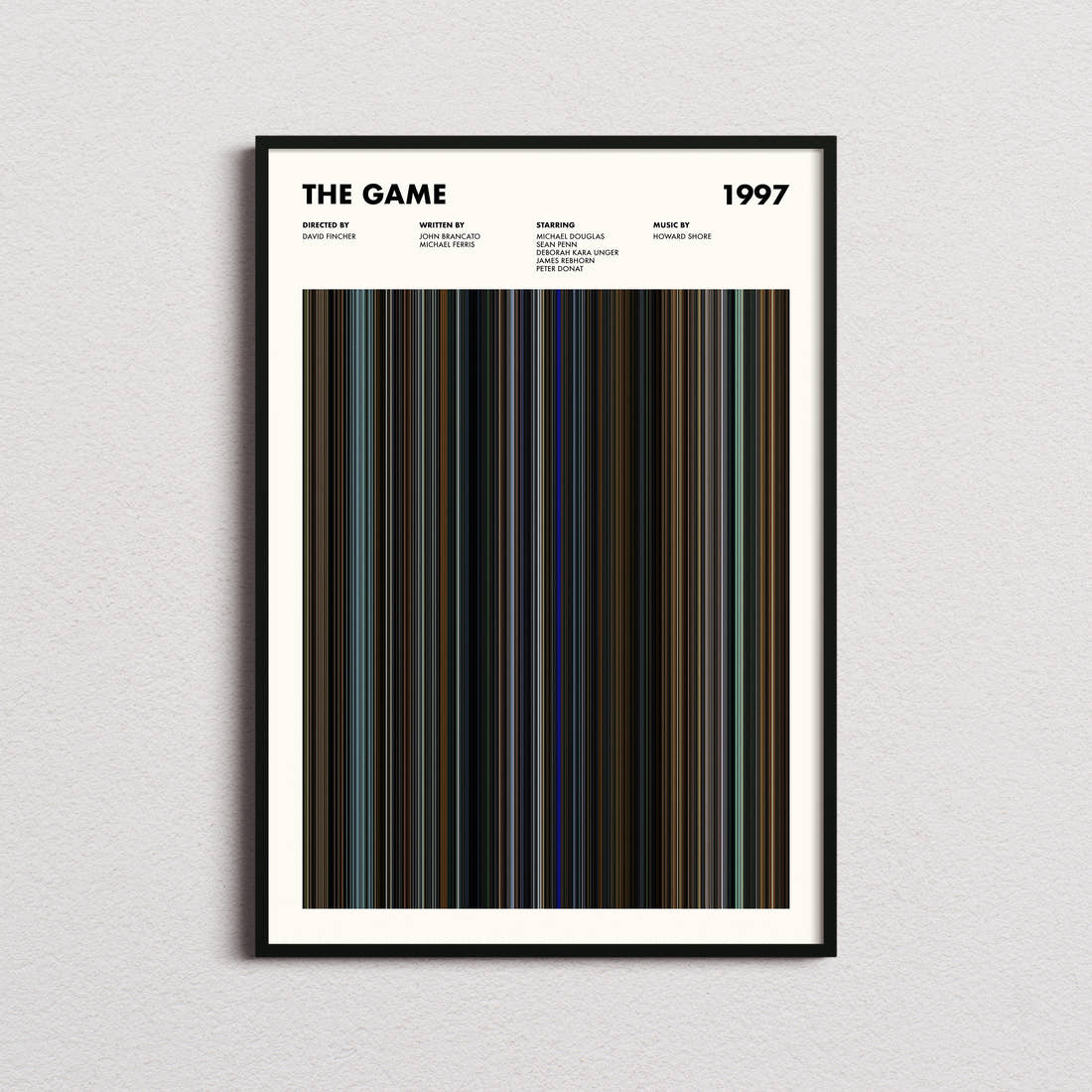 The Game Movie Barcode Poster framed on a plain studio wall
