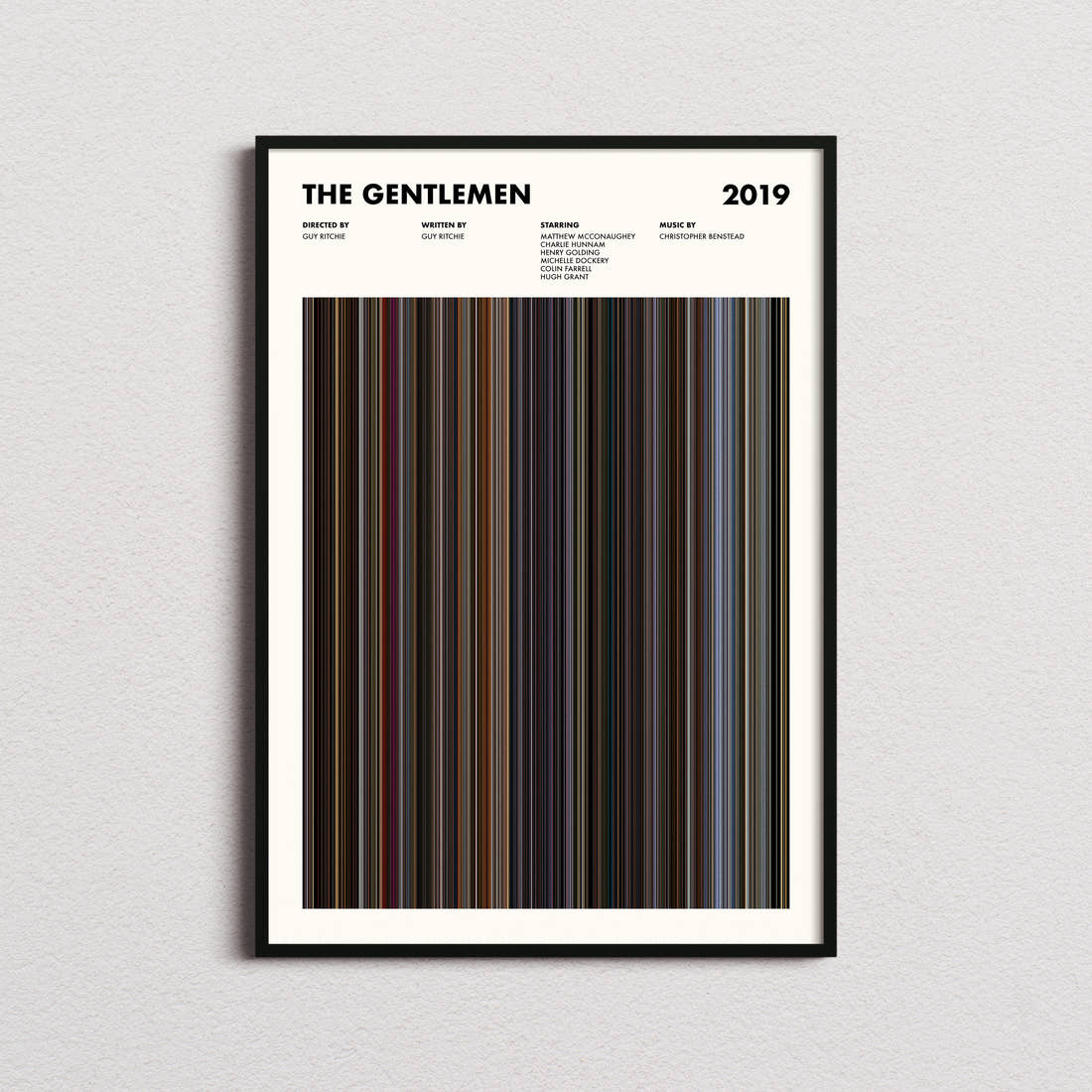 The Gentlemen Movie Barcode Poster framed on a plain studio wall