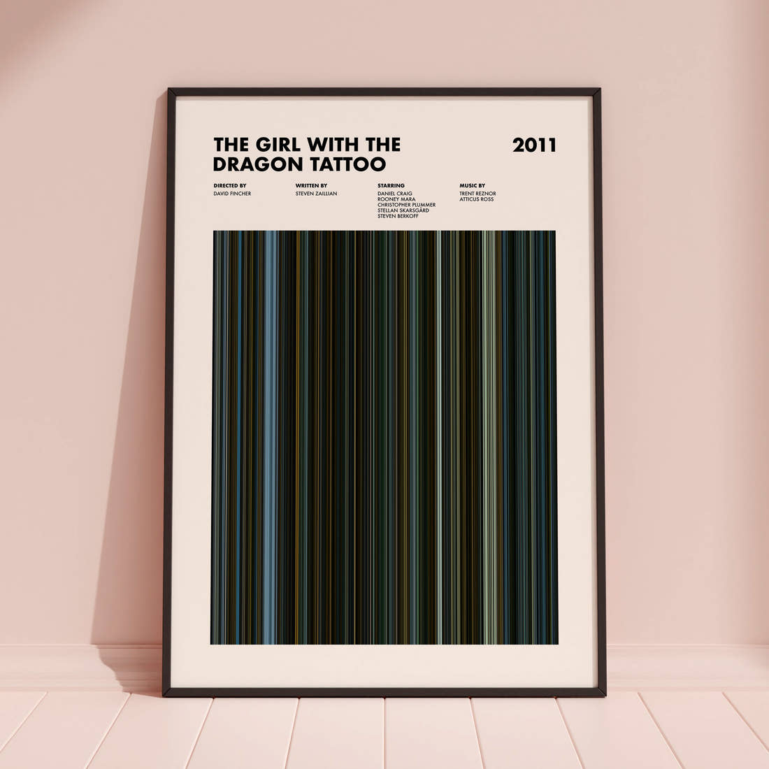 The Girl with the Dragon Tattoo Movie Barcode Poster framed and leaning against a coloured wall