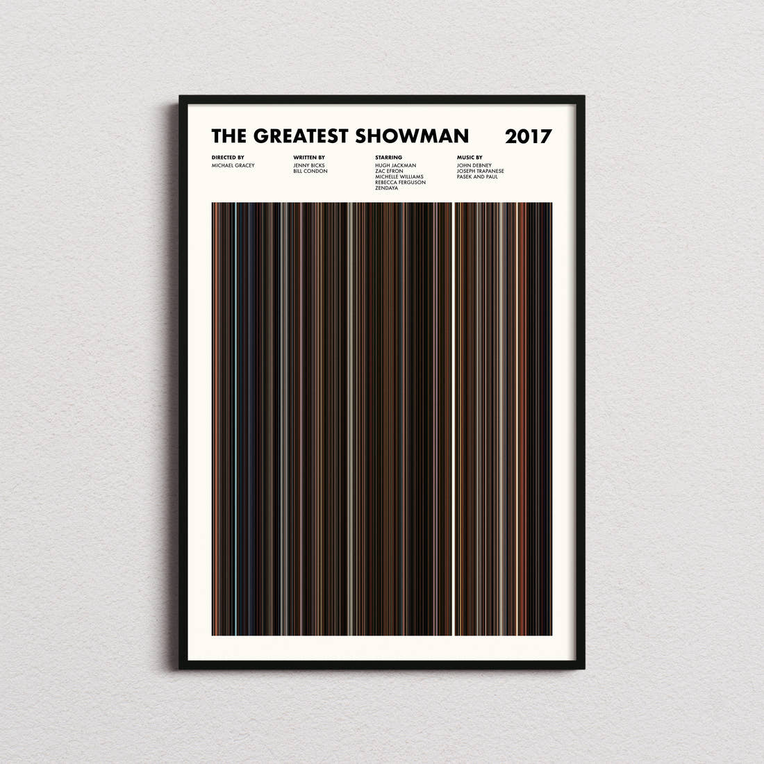 The Greatest Showman Movie Barcode Poster framed on a plain studio wall