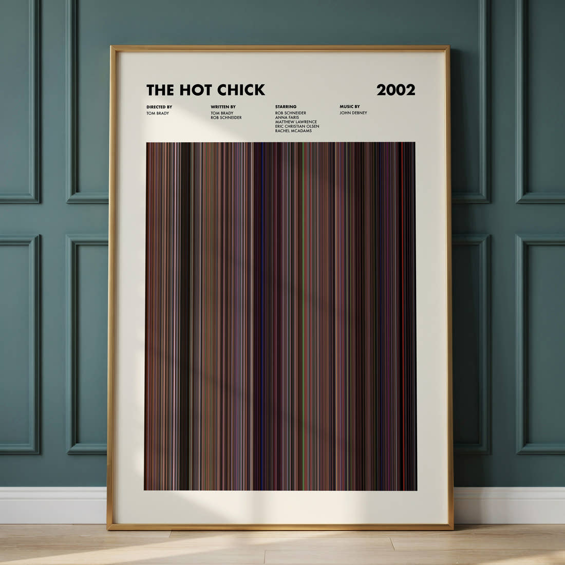 The Hot Chick Movie Barcode Poster framed and leaning against a panelled wall