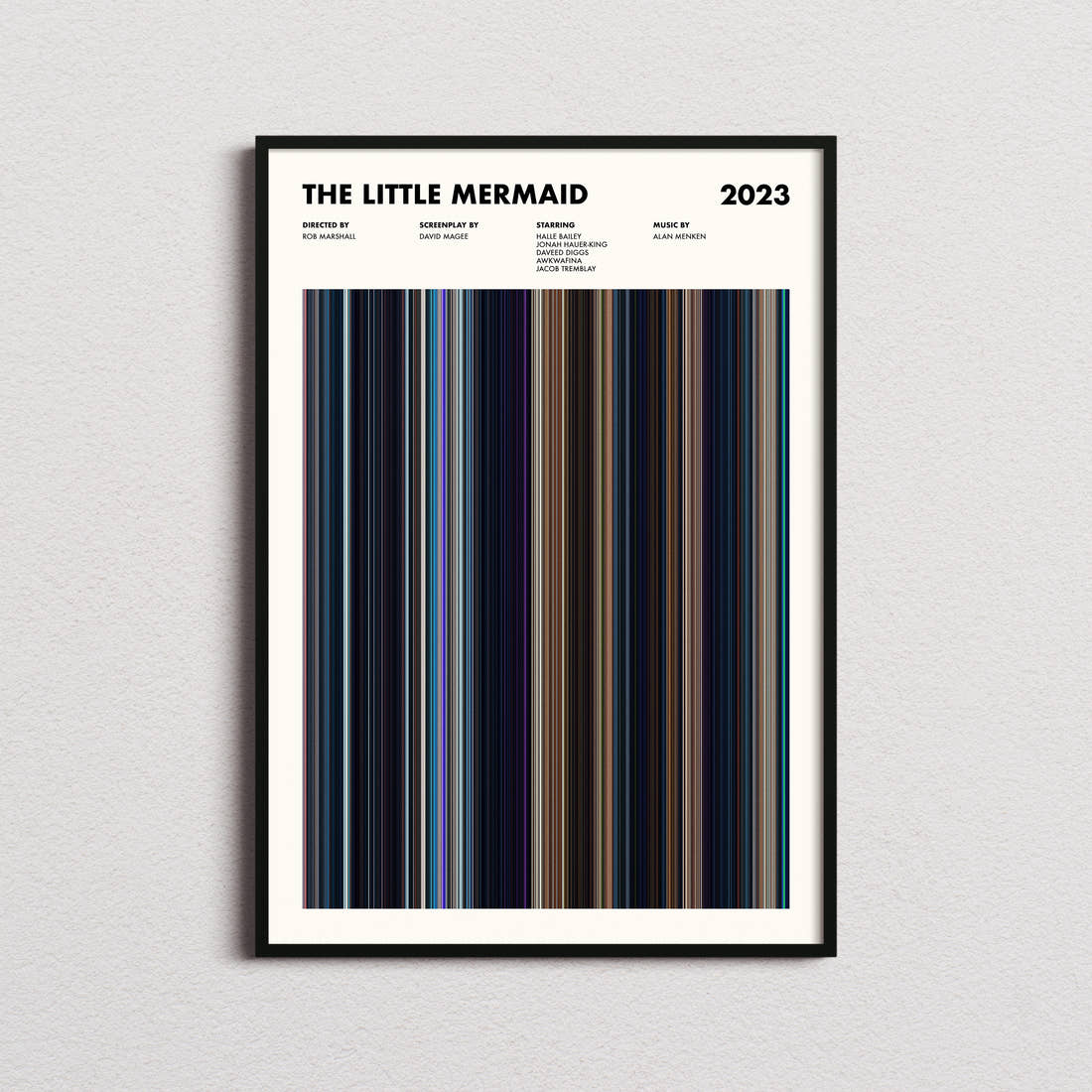 The Little Mermaid 2023 Movie Barcode Poster framed on a plain studio wall