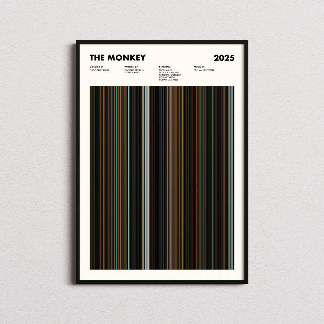 The Monkey Movie Barcode Poster framed on a plain studio wall