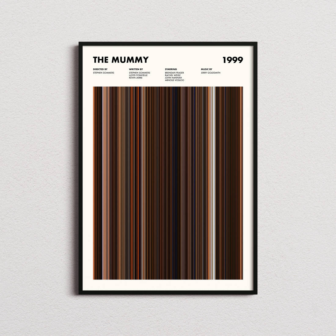 The Mummy Movie Barcode Poster framed on a plain studio wall