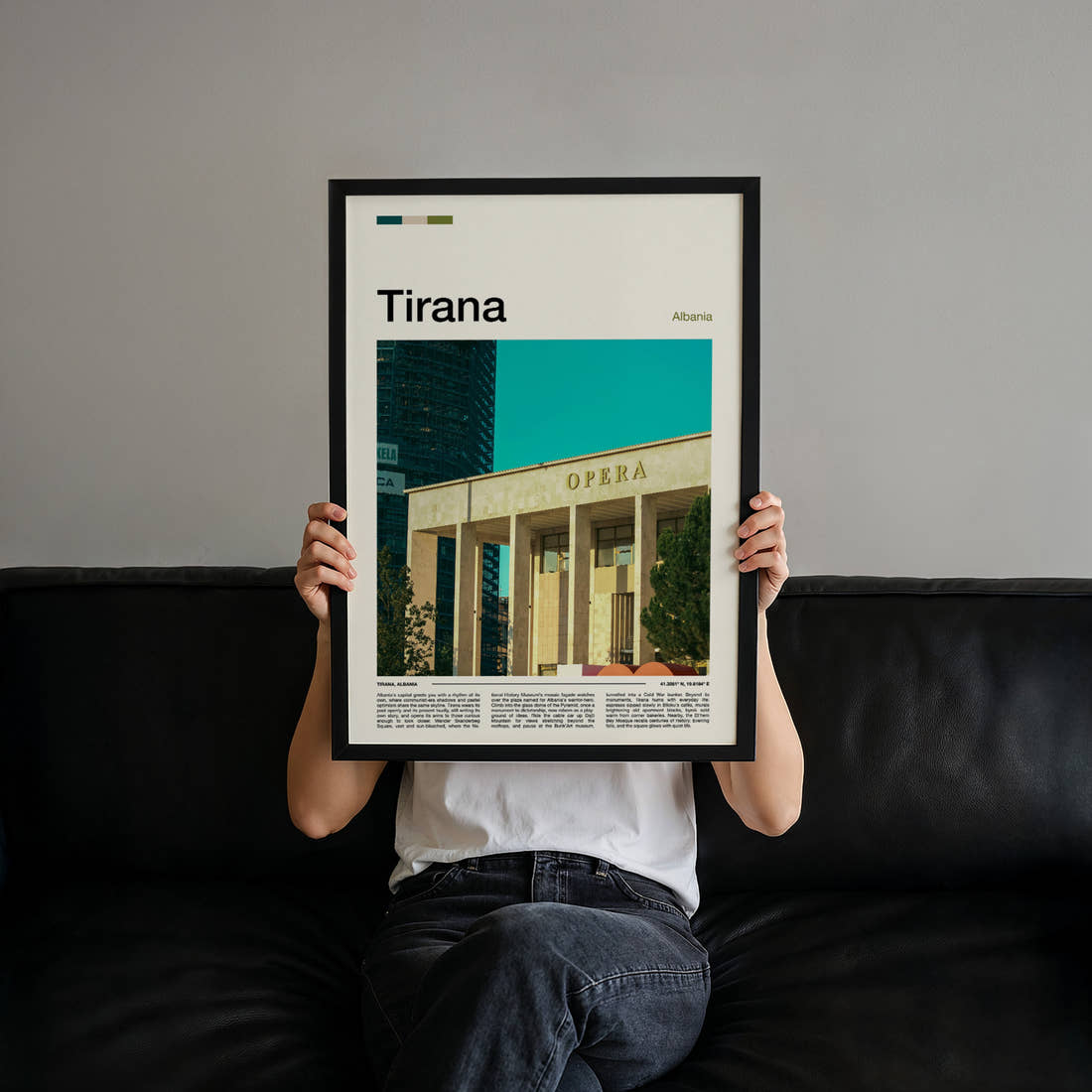 Tirana Opera House Facade Travel Print held up by hand to show the size of the print