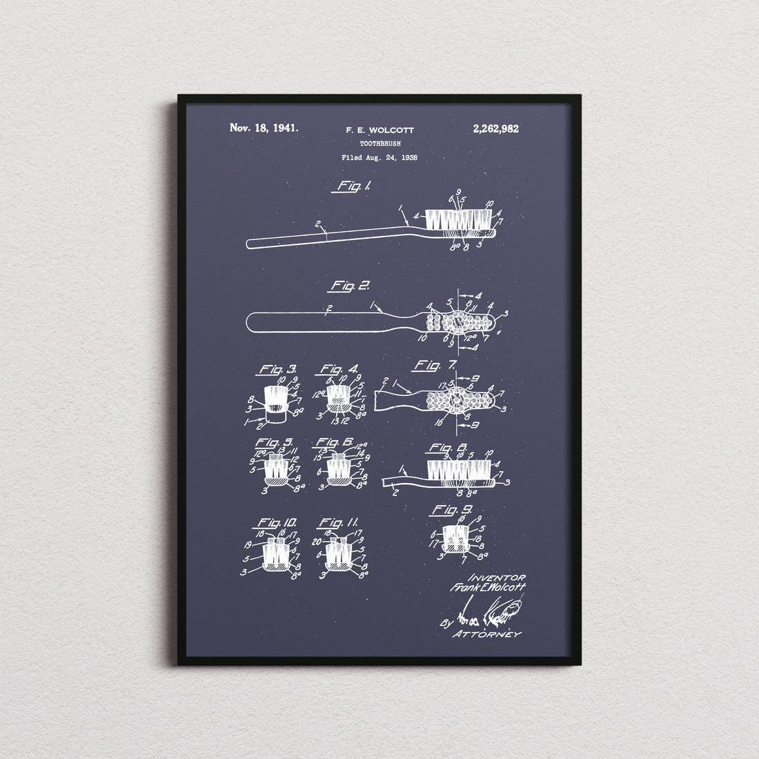 Toothbrush Patent Print in the navy colourway, framed