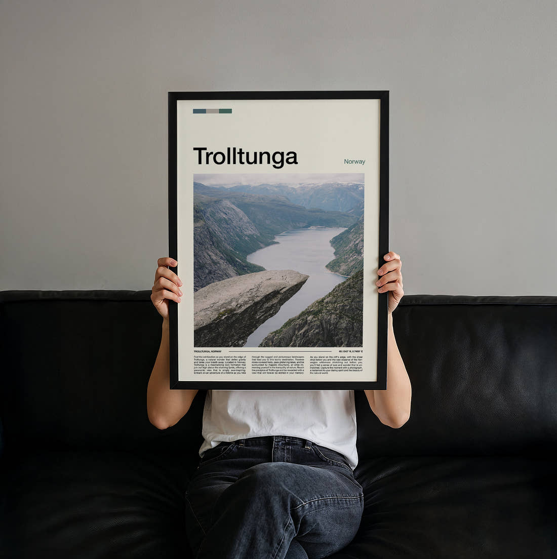 Trolltunga Travel Print held up by hand to show the size of the print