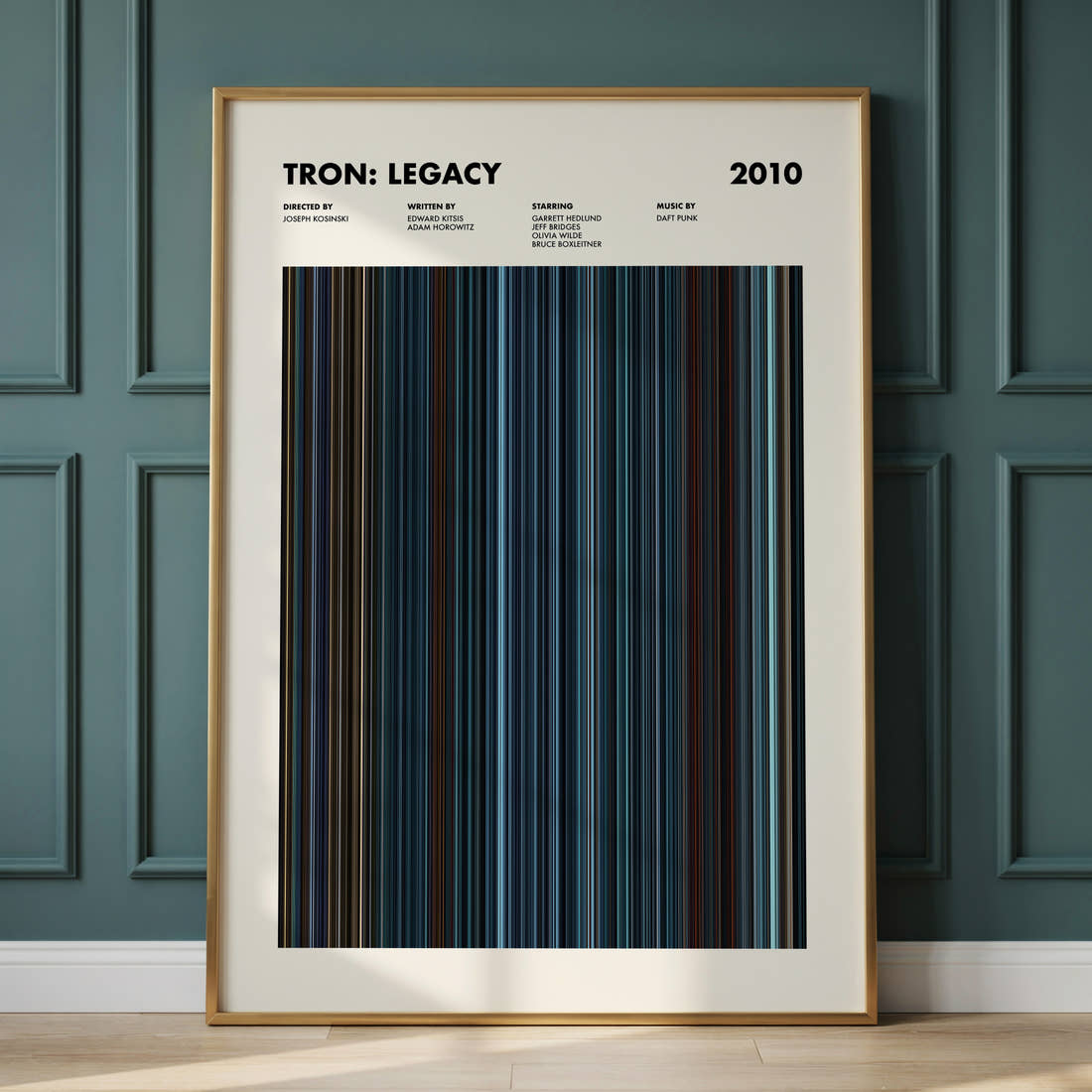 Tron: Legacy Movie Barcode Poster framed and leaning against a panelled wall