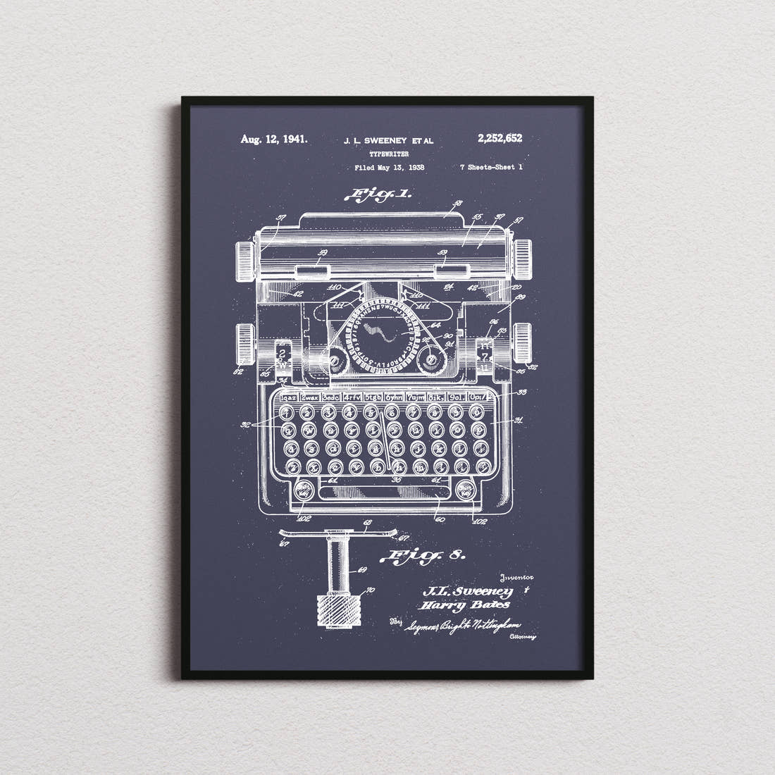 Typewriter Patent Print in the navy colourway, framed