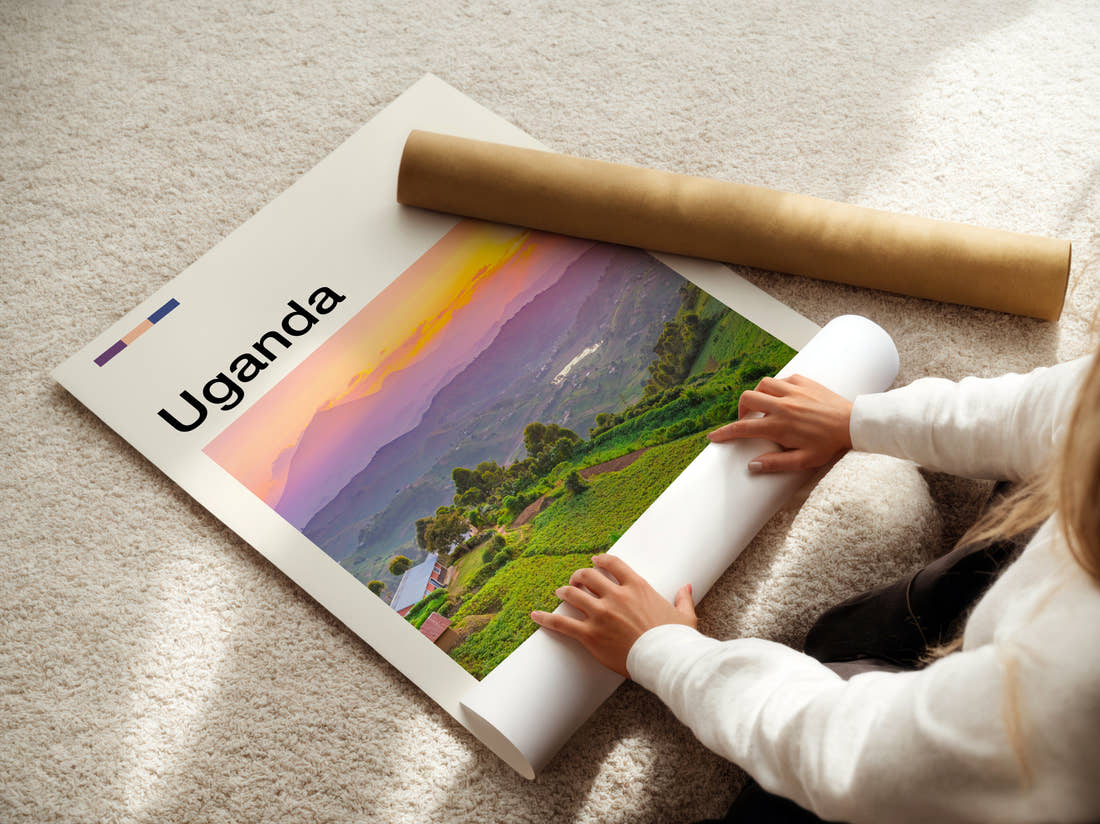Uganda Green Hills At Sunset Travel Print being unrolled from its postal tube