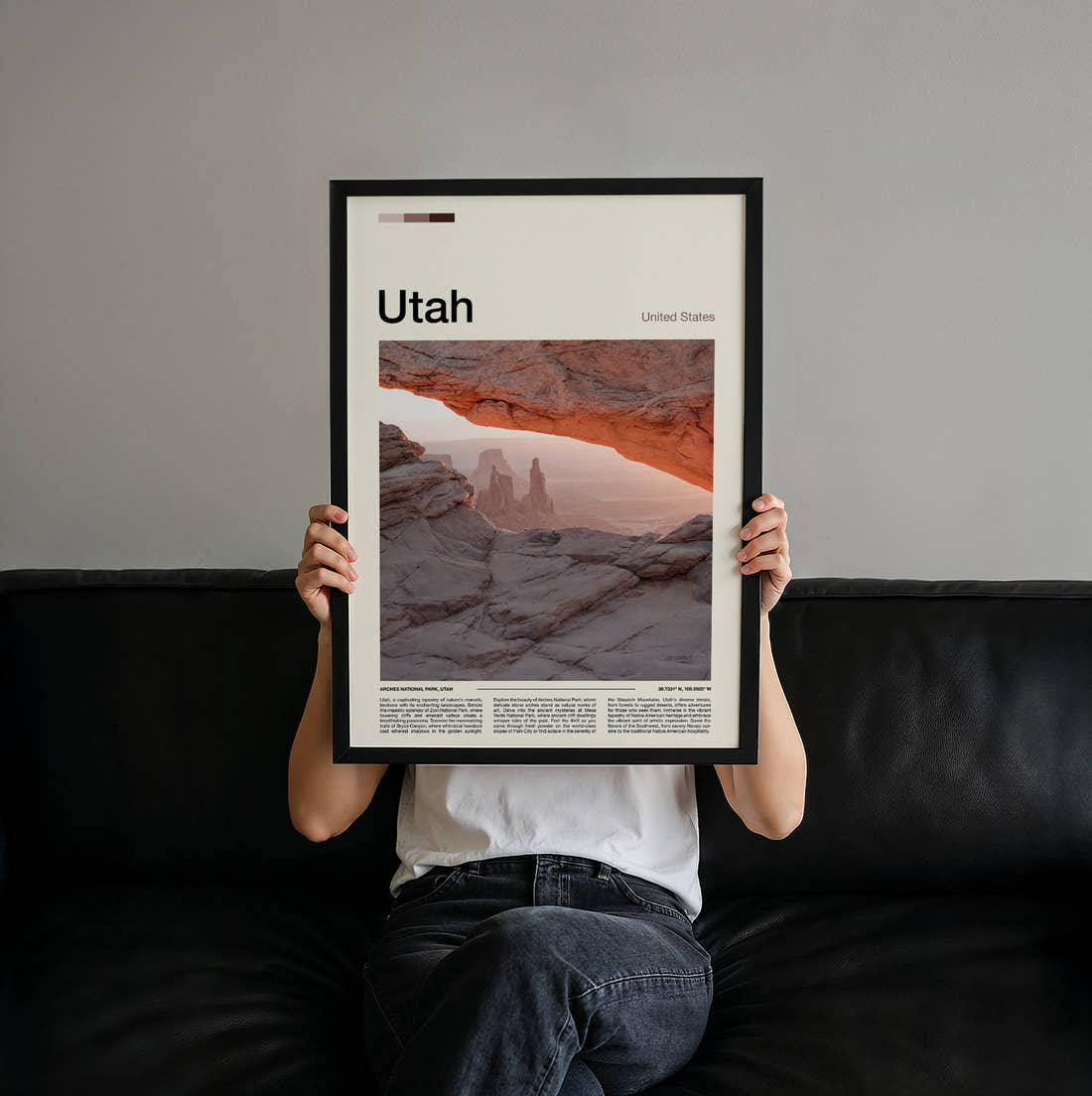 Utah Mesa Arch At Sunrise Travel Print held up by hand to show the size of the print