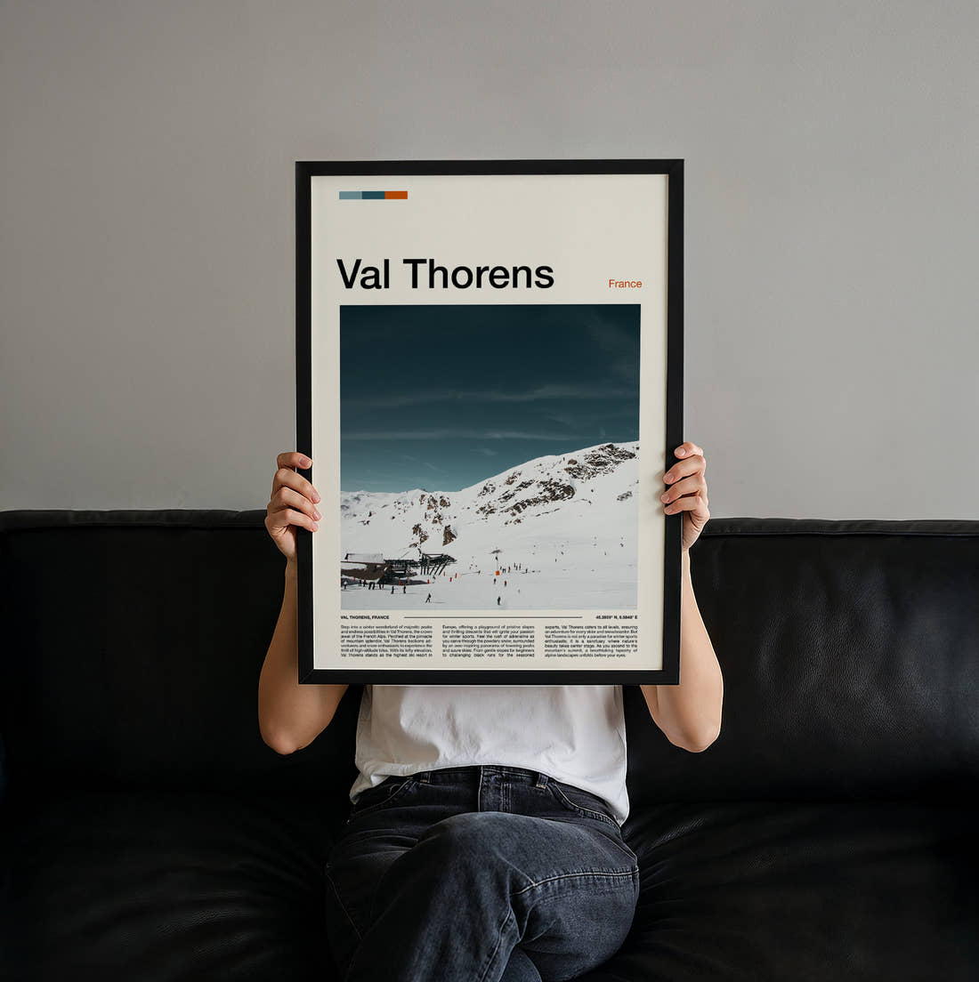 Val Thorens Skiers On The Piste Travel Print held up by hand to show the size of the print