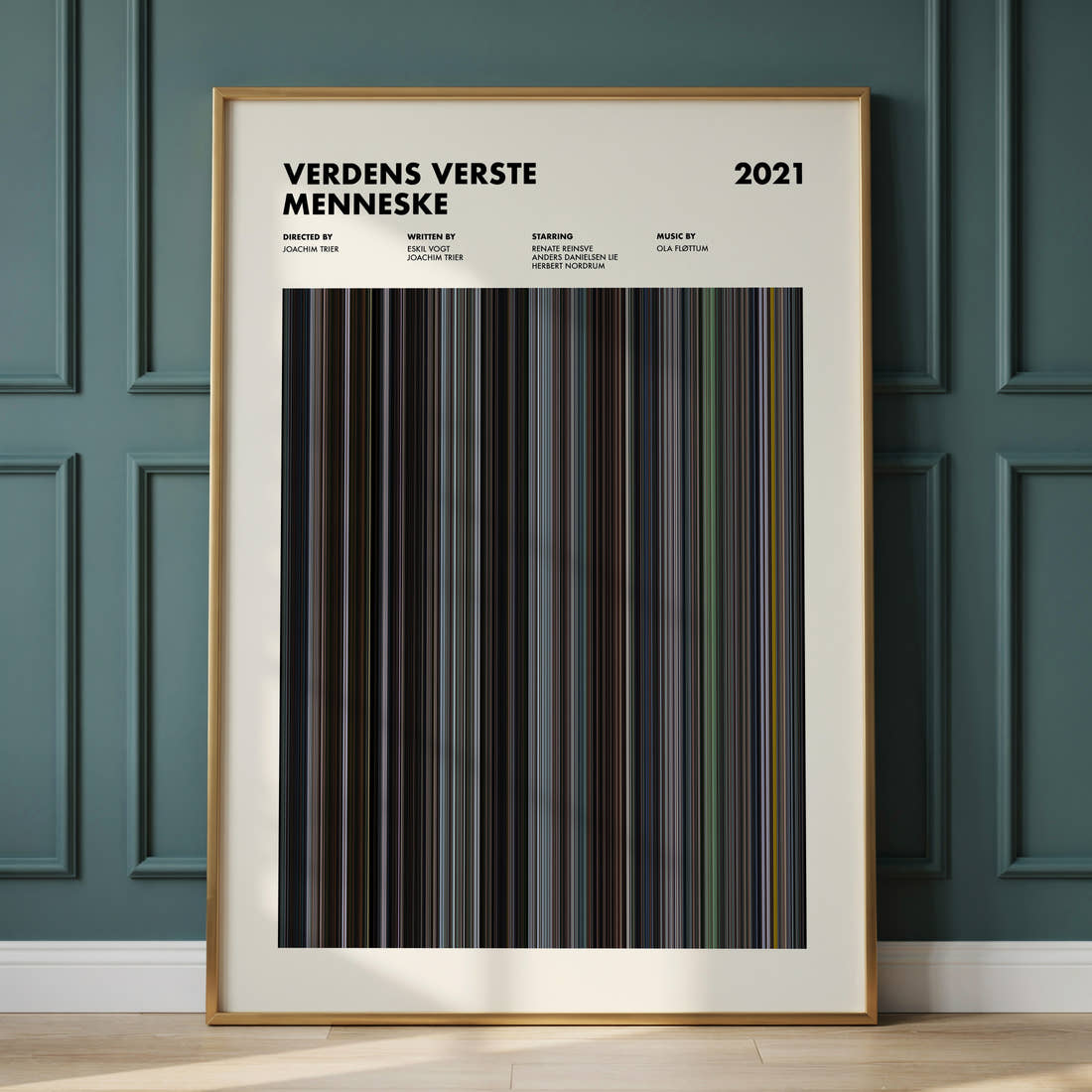 Verdens Verste Menneske Movie Barcode Poster framed and leaning against a panelled wall