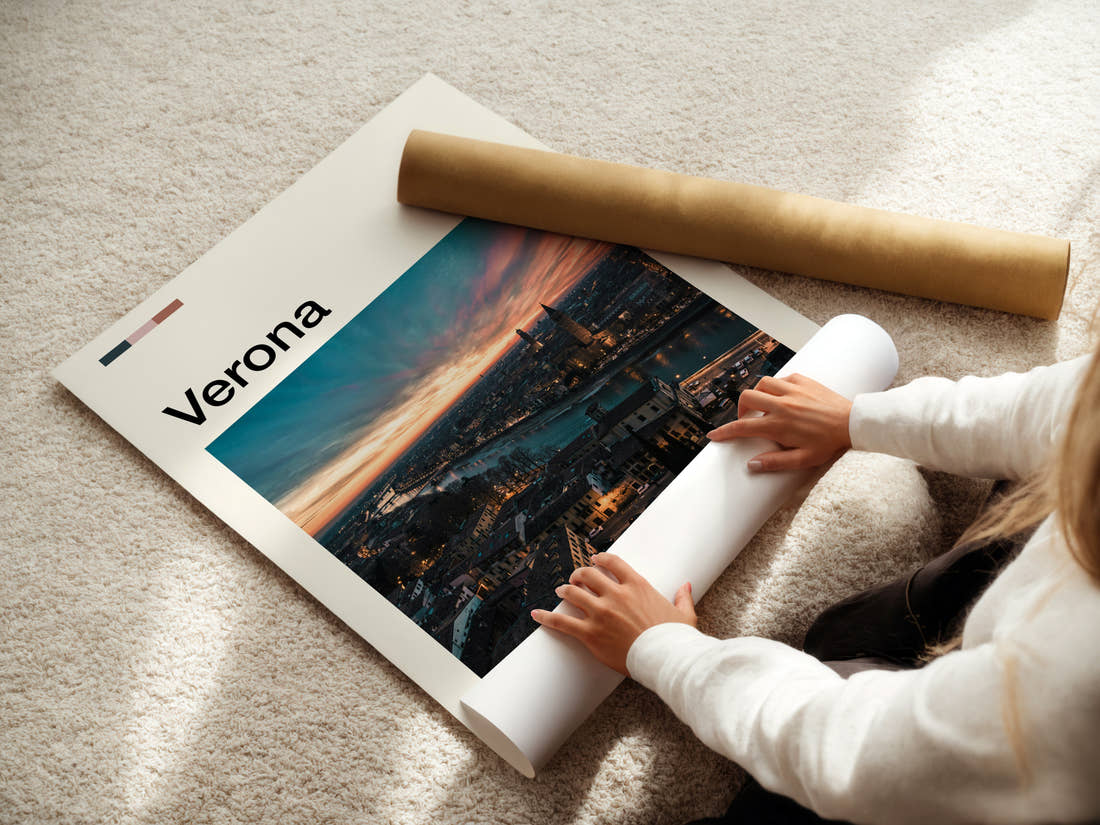 Verona Riverside Skyline Sunset Travel Print being unrolled from its postal tube