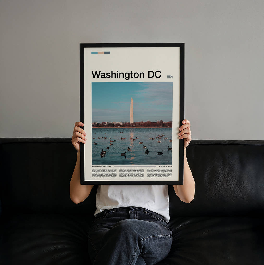 Washington Monument Across The Water Travel Print held up by hand to show the size of the print