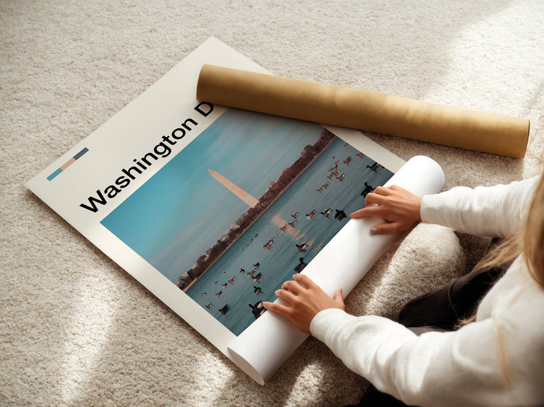 Washington Monument Across The Water Travel Print being unrolled from its postal tube