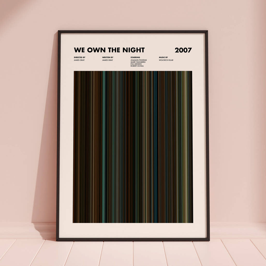 We Own The Night Movie Barcode Poster framed and leaning against a coloured wall