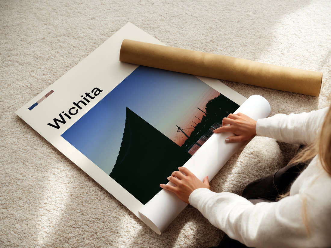 Wichita Riverside Sunset Silhouette Travel Print being unrolled from its postal tube
