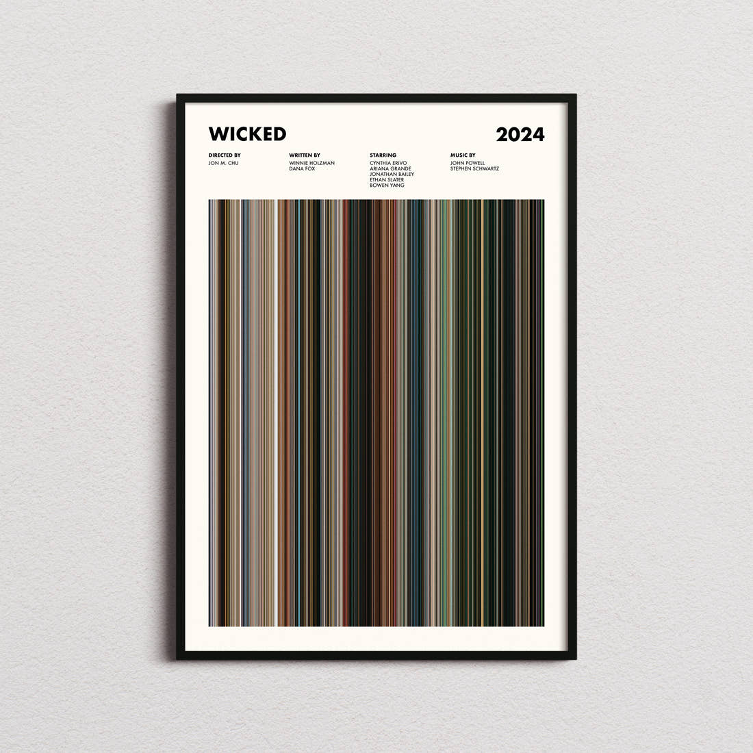 Wicked Movie Barcode Poster framed on a plain studio wall